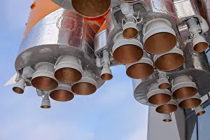 Russian Space Exploration Prints: Details of space rocket engine over blue sky background