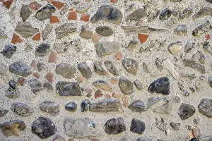 Stone Wall Background Prints: Different types of stone processed into a wall Format-filling