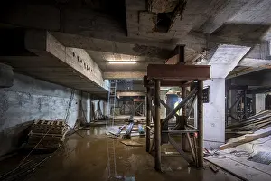 Construction Site Details Prints: A dimly lit basement under construction
