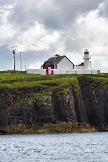 Dingle Peninsula Ireland Prints: Dingle Lighthouse on cliffs, Dingle Bay