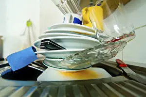 Kitchen Cleanliness Prints: Dirty tableware in a kitchen