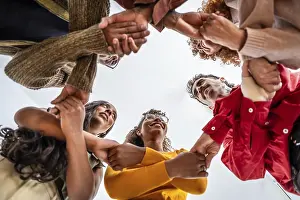 Teamwork And Collaboration Prints: Diverse group standing in a circle