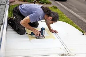 Images Dated 1st June 2024: DIY Camper Jumper Van Conversion Print - Cutting Top Window