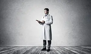 Healthcare System Employee Prints: Doctor with a tablet with documents