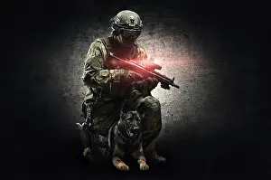 German Shepherd Breed Prints: Dog handler posing in the studio with a trained shepherd
