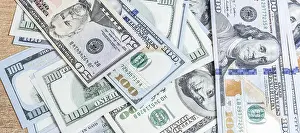 Hundred Dollar Bills Prints: Many hundred dollar bills on the table