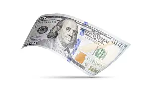 One Hundred Dollar Bill Prints: One hundred dollar bill floating down to surface with drop shadow isolated on a white background