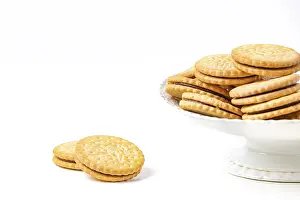 Studio Shot Dessert Prints: Double biscuits in and next to white bowl
