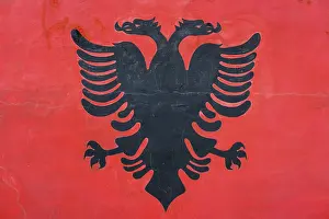 Prints of Double-headed eagle, Albanian flag painted on wall, Kucova, Albania Double-headed eagle, Albanian flag painted on wall, Kuova, Albania Albania Prints: Double-Headed Eagle Print, Albanian Flag in Kucova, Albania