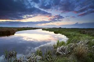 Prints of Dramatic calm sunset over river, Drenthe, Netherlands River Prints: Dramatic Calm Sunset Print over Dutch River