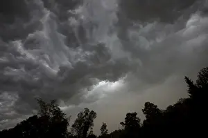 Overcast Sky Photography Prints: Dramatic cloud formation in front of a storm