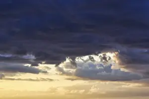 Sunset Over Baltic Sea Prints: Dramatic cloud sky at sunset, blue and yellow
