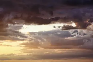 Sunset Over Baltic Sea Prints: Dramatic cloud sky at sunset, pink