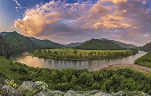 Atmospheric Evening Sky Prints: Dramatic clouds during dusk over Tuul river