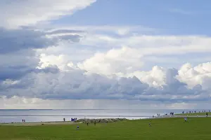 Lower Saxony Waterfront Prints: Dramatic clouds over the North Sea