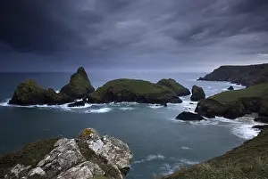 Dramatic Clouds Prints: Dramatic clouds on rocky coast