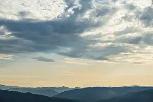 Hilly Countryside View Prints: Dramatic clouds and silhouette of hills
