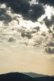Evening Sky Europe Prints: Dramatic clouds and silhouette of hills
