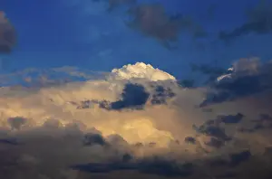 Gloomy Evening Sky Prints: Dramatic cloudscape with (cumulus) clouds at dusk
