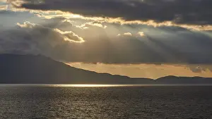 Dramatic Evening Sky Prints: Dramatic cloudy evening sky, sun rays breaking through clouds