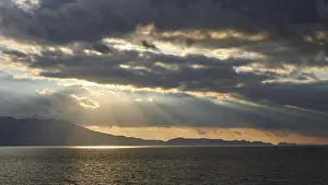 Southeast Europe Landscapes Prints: Dramatic cloudy evening sky, sun rays breaking through clouds