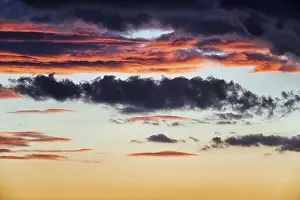 Cloudy Atmospheric Light Prints: Dramatic cloudy sky, dark storm clouds at sunset