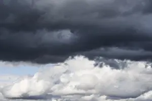 Cumulus Humilis Clouds Prints: Dramatic cloudy sky, dark thundercloud over light cumulus clouds