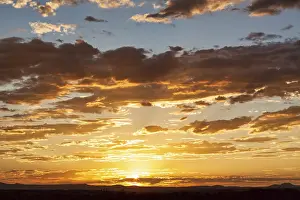 Sunset In The USA Prints: Dramatic cloudy sky at sunset, backlight