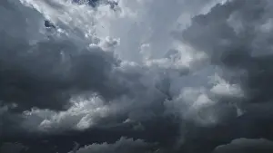 Dark Storm Clouds Prints: Dramatic dark storm clouds in sky background