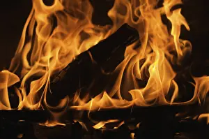 Dark Background Flames Prints: Dramatic flames against A dark background