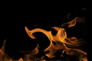 Plain Colored Background Wallpaper Prints: Dramatic flames against A dark background