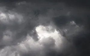 Cloudy Atmospheric Light Prints: Dramatic lighting mood with dark thunderclouds