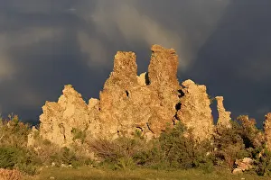 Mono Lake Rock Formations Prints: Dramatic rock formations against a cloudy sky at dusk