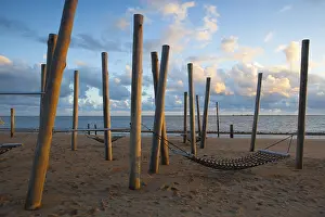 Evening Sun In Europe Prints: Dramatic sunset on the empty beach