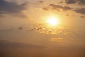 Cloudy Desert Landscape Prints: Dramatic sunset with clouds and sun