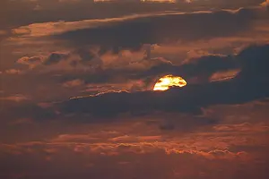 Evening Atmosphere In Nature Reserve Prints: Dramatic sunset with clouds and sun