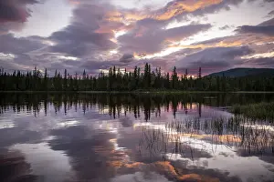 Dramatic Sunset Norway Prints: Dramatic sunset by the river Namsen with reflection