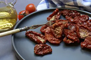 Empty Plate With Fork Prints: Dried tomatoes on plate with fork
