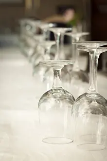 Deserted Dining Table Prints: Several drinking glasses abstract in formal dining room setting