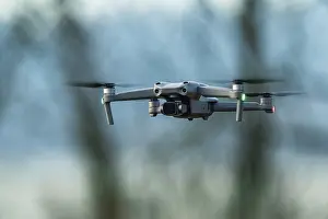 Aviation Technology Europe Prints: Drone in flight over marshland
