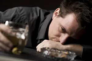 Gloomy Atmosphere Prints: Drunk man with beer