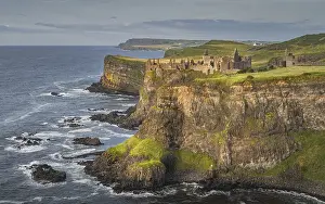United Kingdom Travel Photography Prints: Dunluce Castle illuminated by sunlight