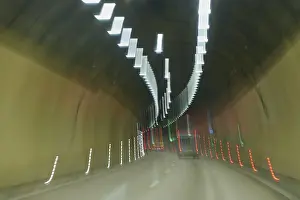 Light Trail Photography Prints: Dynamic light strips in a tunnel create blur and an impression of speed