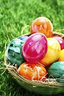 Colorful Easter Eggs Prints: Easter eggs in an Easter nest on a lawn