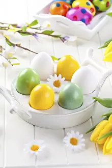 Christian Easter Traditions Prints: Easter eggs with spring flowers decorating table