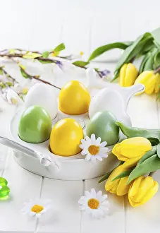 Christian Easter Traditions Prints: Easter eggs with spring flowers decorating table