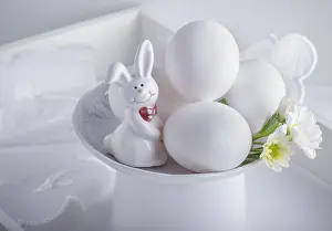 Easter Bunny Figurine Prints: Eggs Rabbit and flowers on white surface