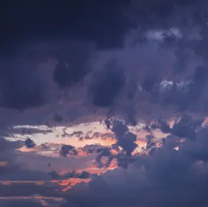 Cloudy Evening Scene Prints: Evening clouds in front of a thunderstorm