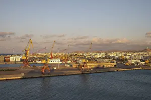 Blue Sky Clouds Greece Prints: Evening light, loading cranes, harbour