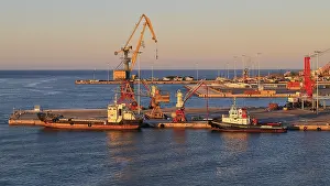 Greek Harbour Scene Prints: Evening light, pier, loading cranes